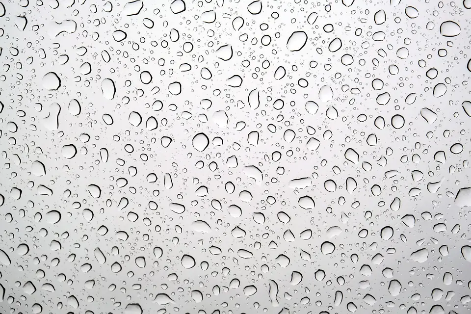 Raindrops on a car roof